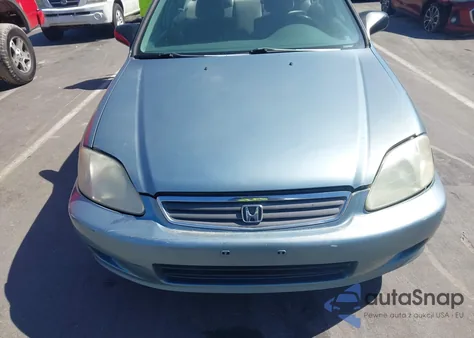 1999 Honda Civic Lx from USA, damaged, VIN 1HGEJ667XXL013276